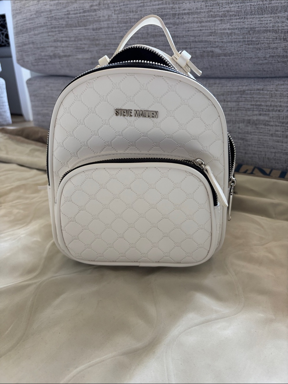 Steve Madden Cream Quilted Mini Backpack with Silver Hardware